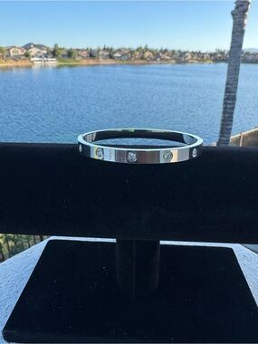 Silver Tone Love Bangle Bracelet with Zirconia Accents